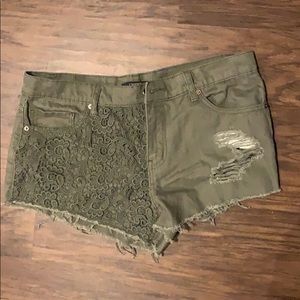 Green shorts with unique lace detail